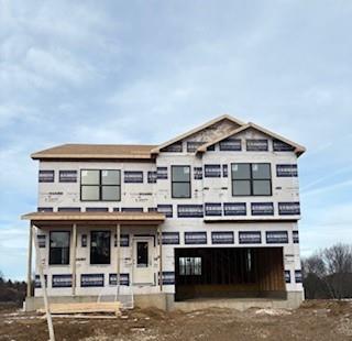 a view of a large building with a small yard