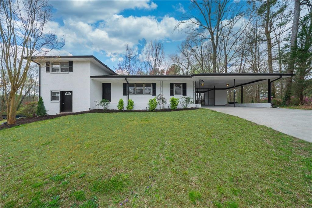 a house view with a garden space