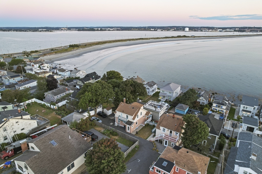 an aerial view of a city and lake view