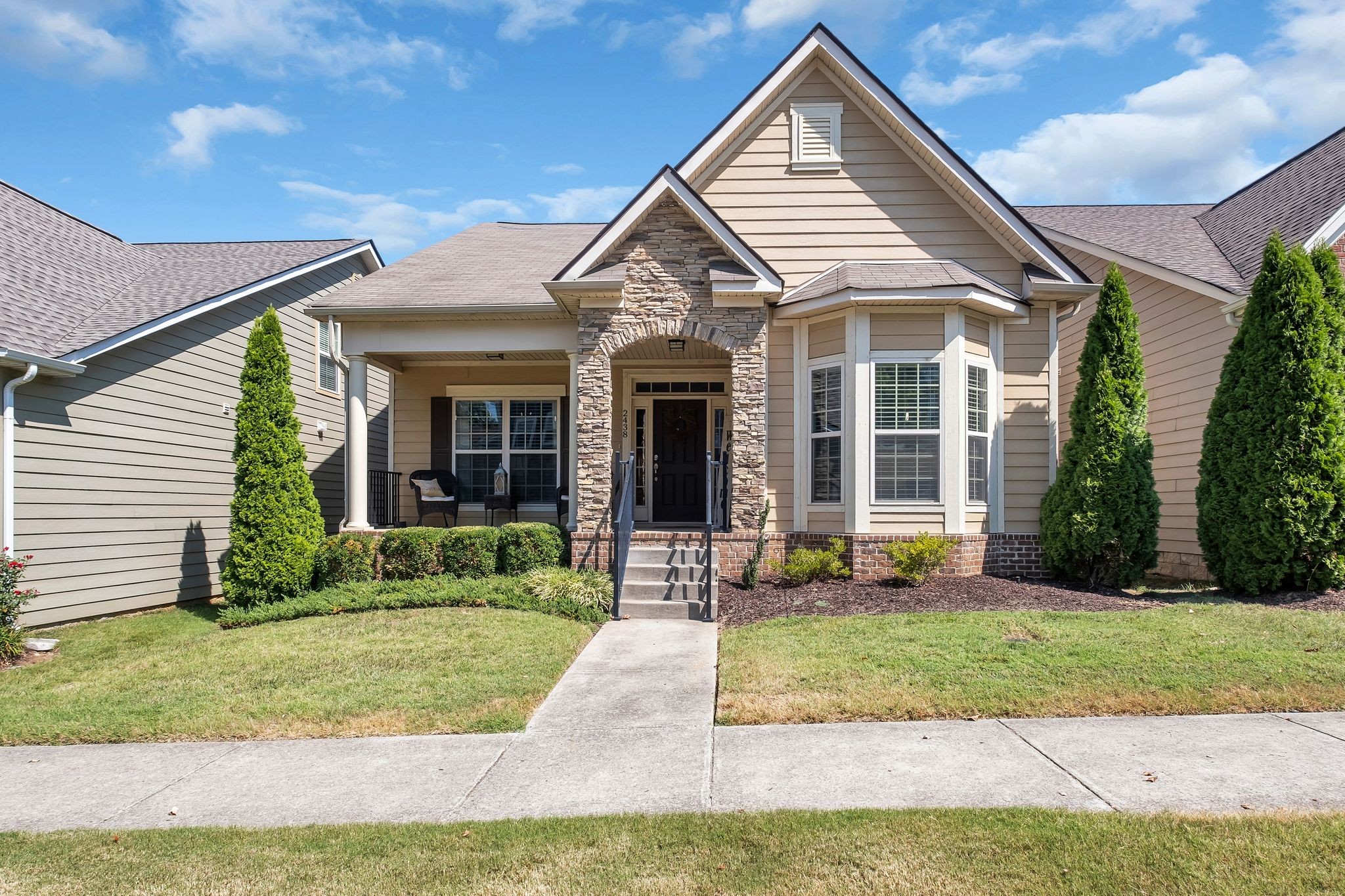 Sit on your front porch while the HOA takes care of your yard maintenance.