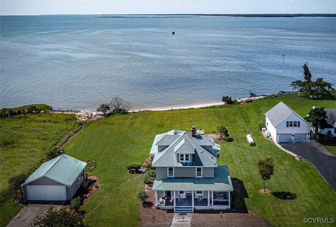 an aerial view of a house with a garden