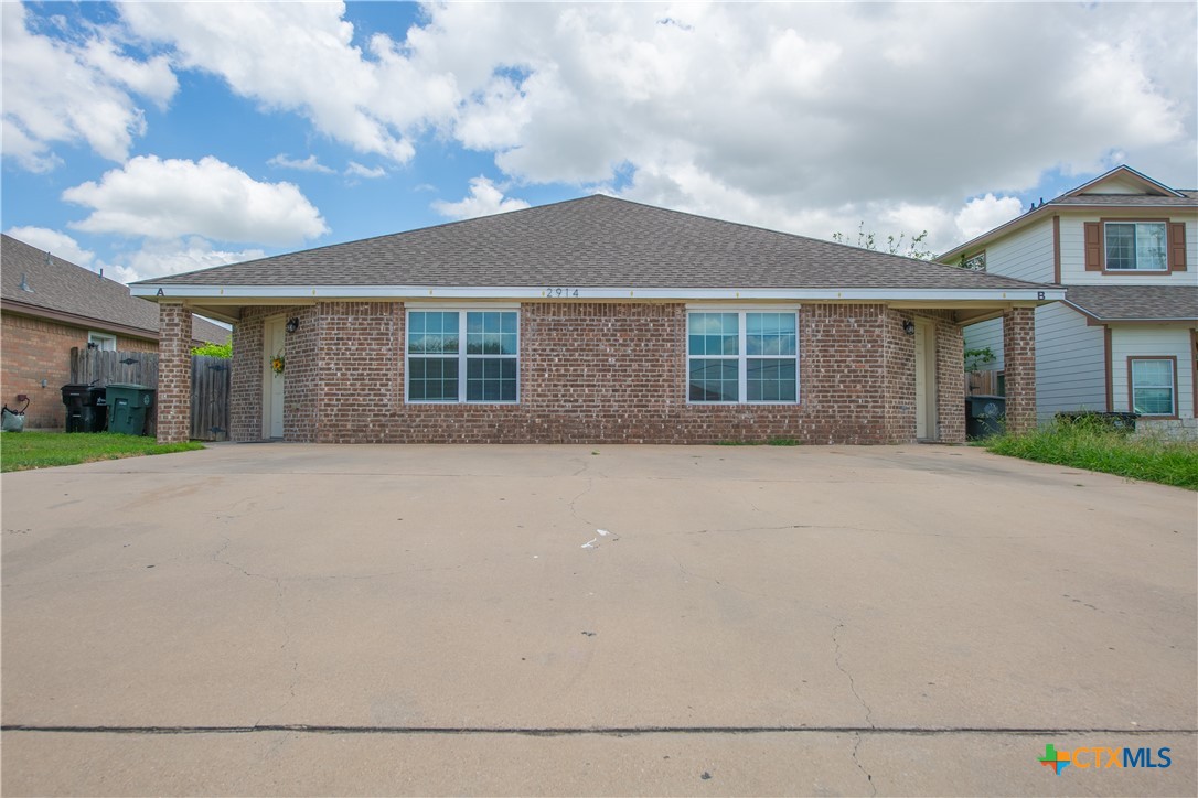 a front view of house with yard