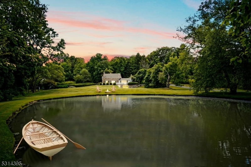 a view of a swimming pool with a lake view