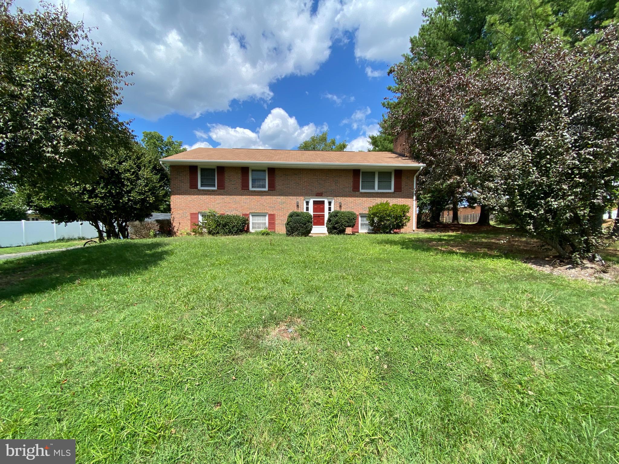 a view of a house with a big yard