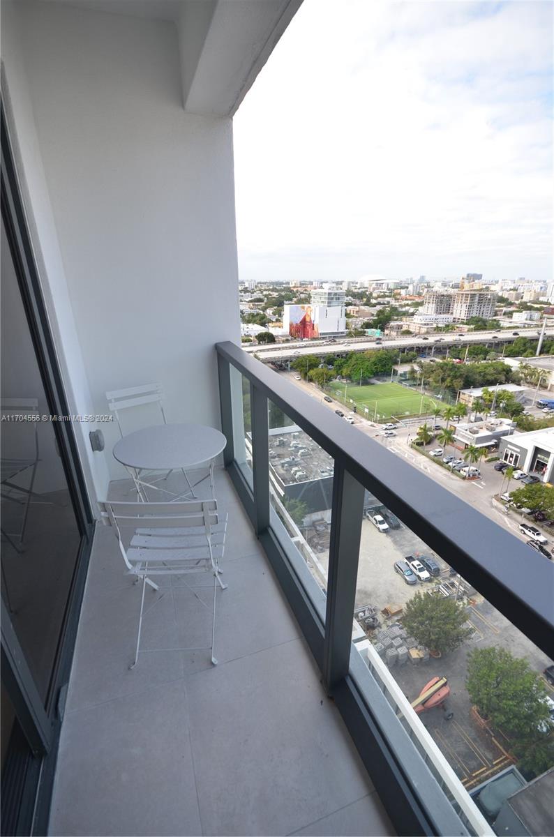 a view of balcony with city view