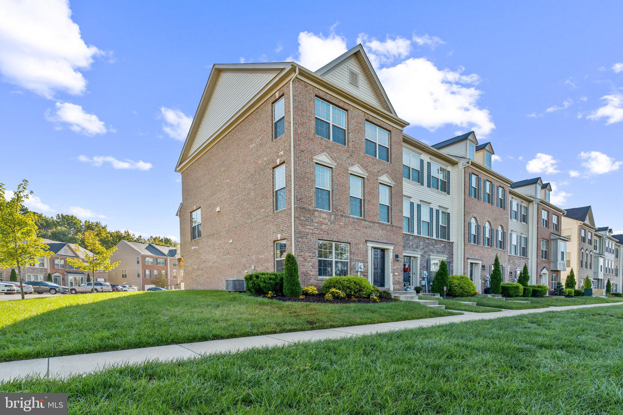 a view of a building with a yard