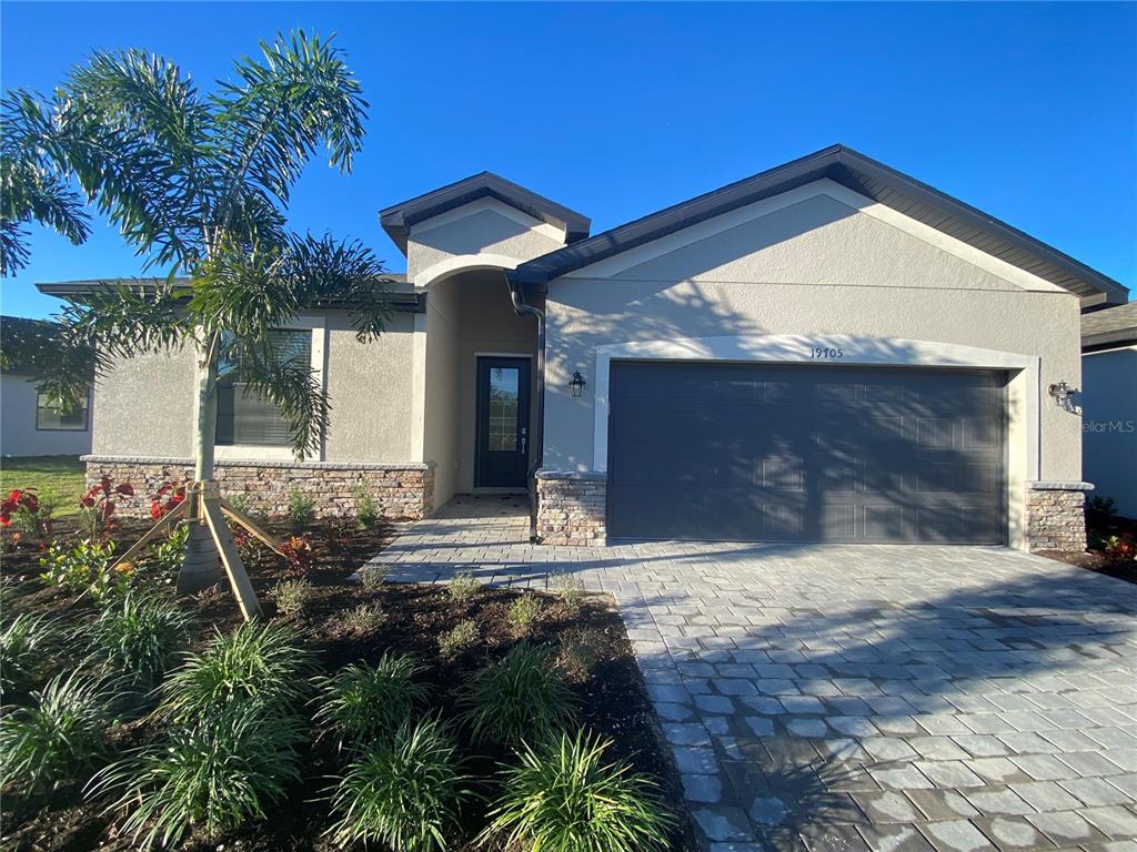 a view of outdoor space yard and garage