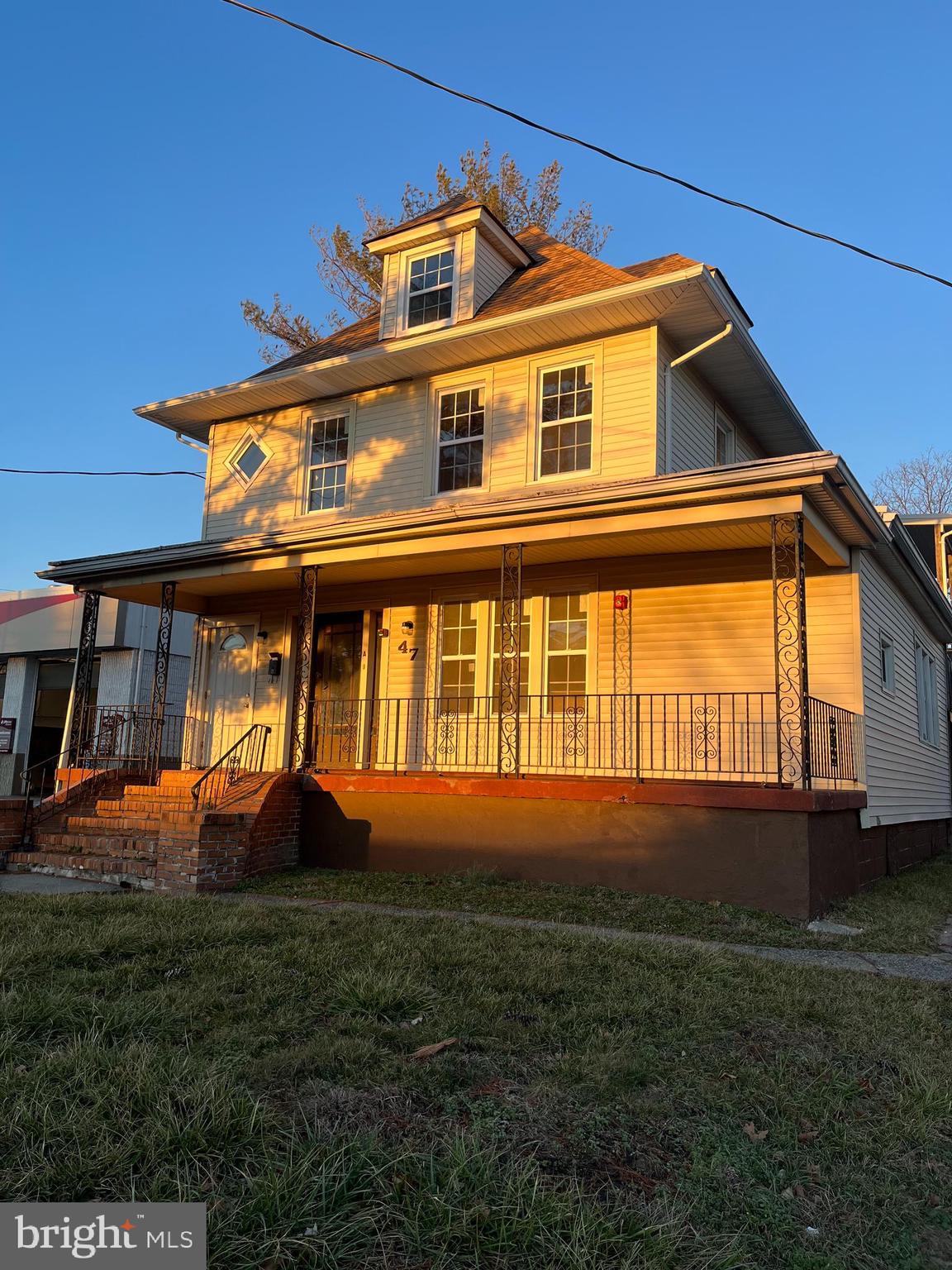 a front view of house with outdoor space