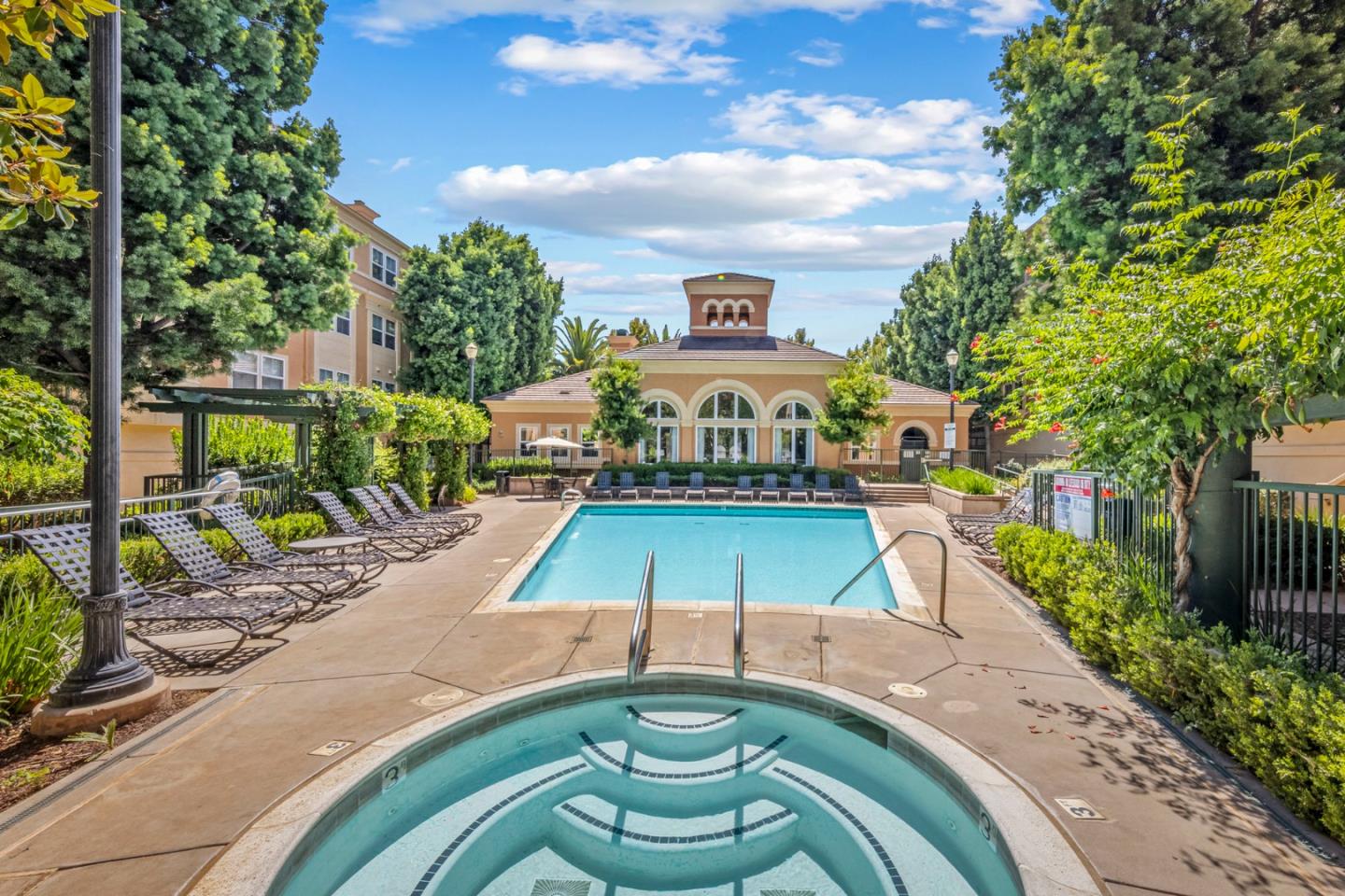 a view of a swimming pool with a patio