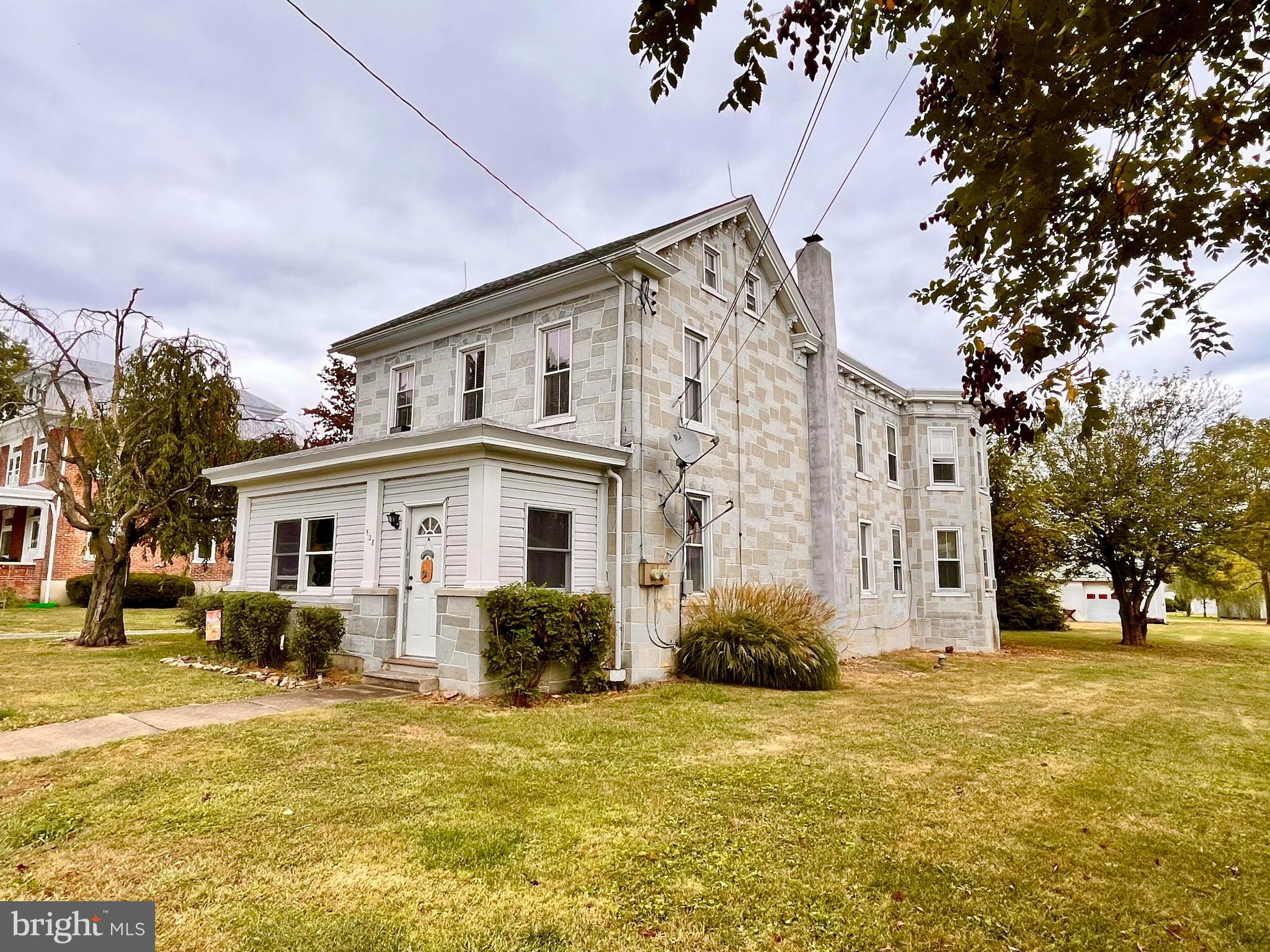 a front view of house with yard