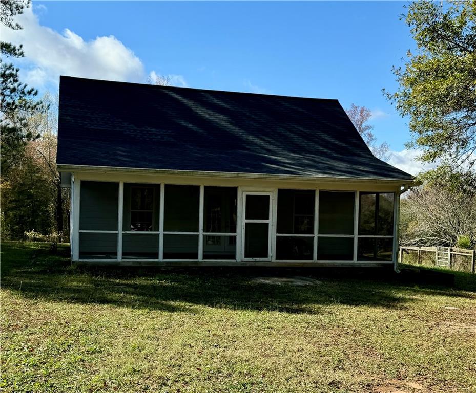 a view of a house with a garden