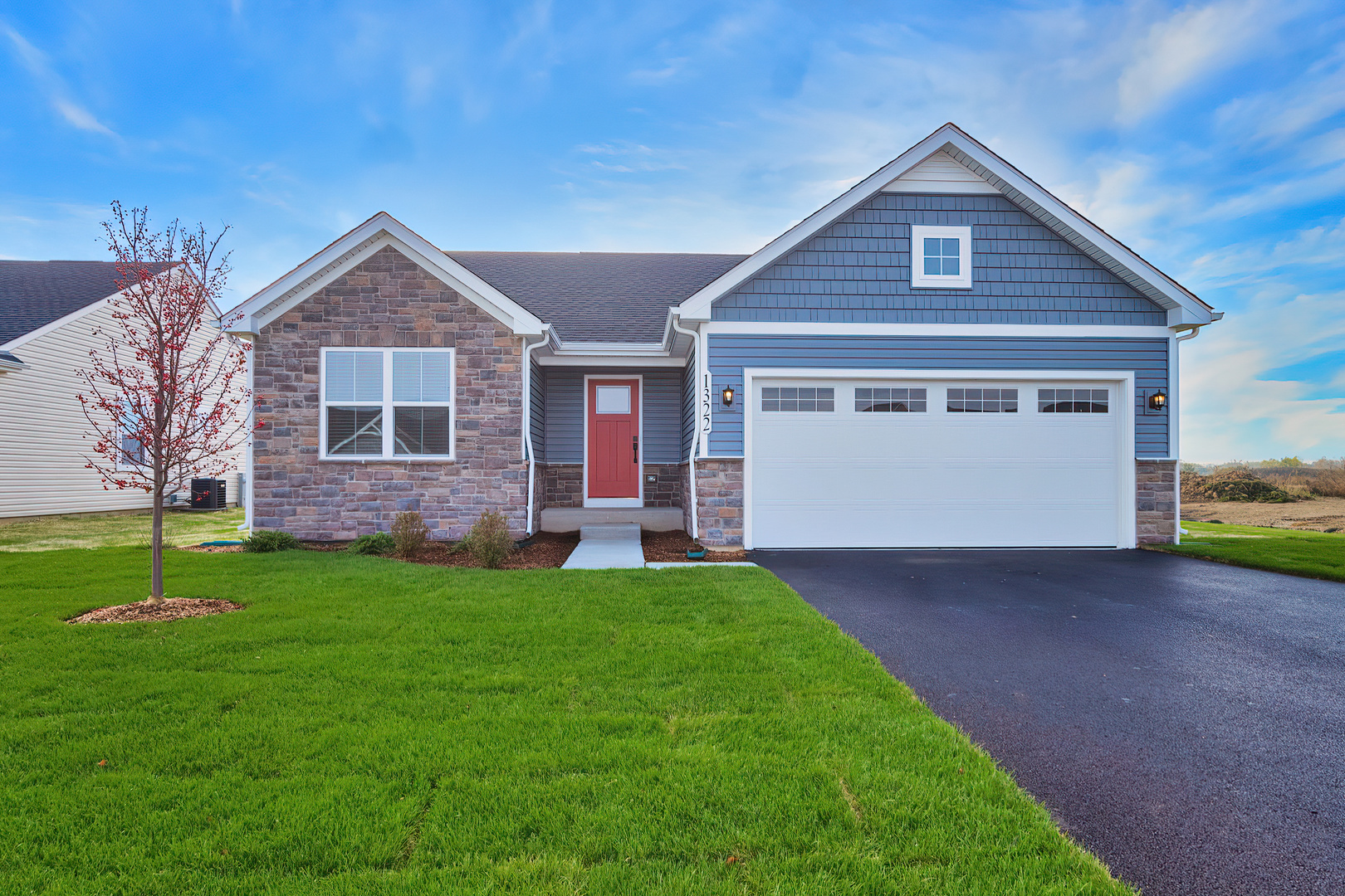 a view of a house with a yard