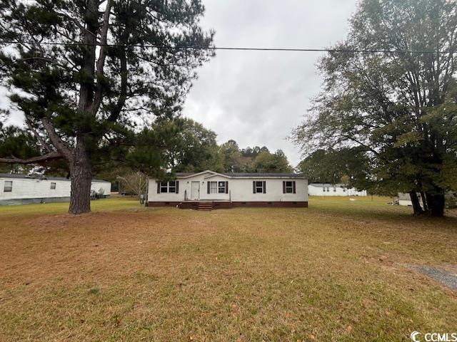 View of front of home with a front lawn