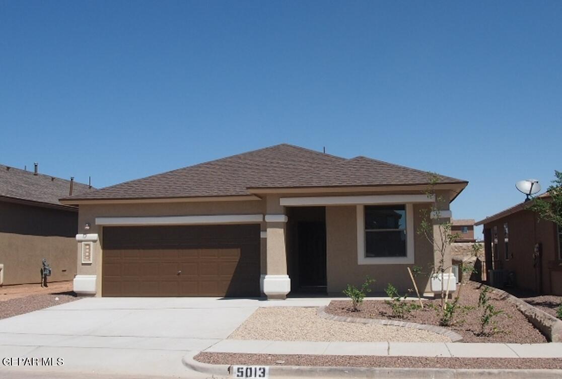 a front view of a house with yard