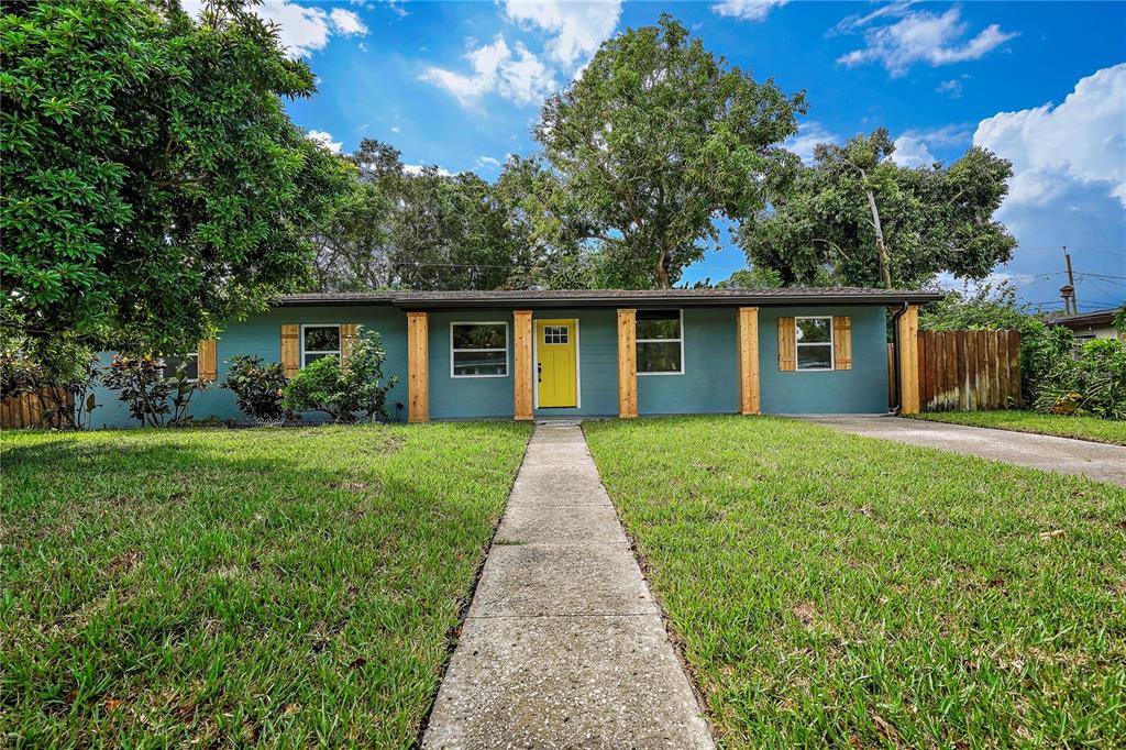 front view of a house with a yard