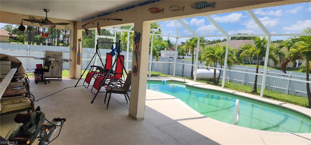 a view of a swimming pool with a porch