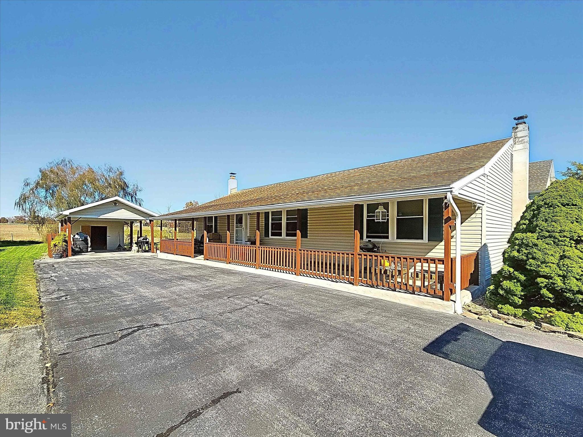 a front view of a house with a porch