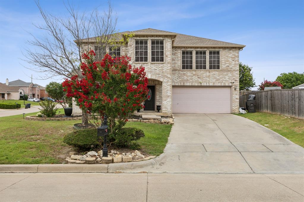 a front view of house with yard