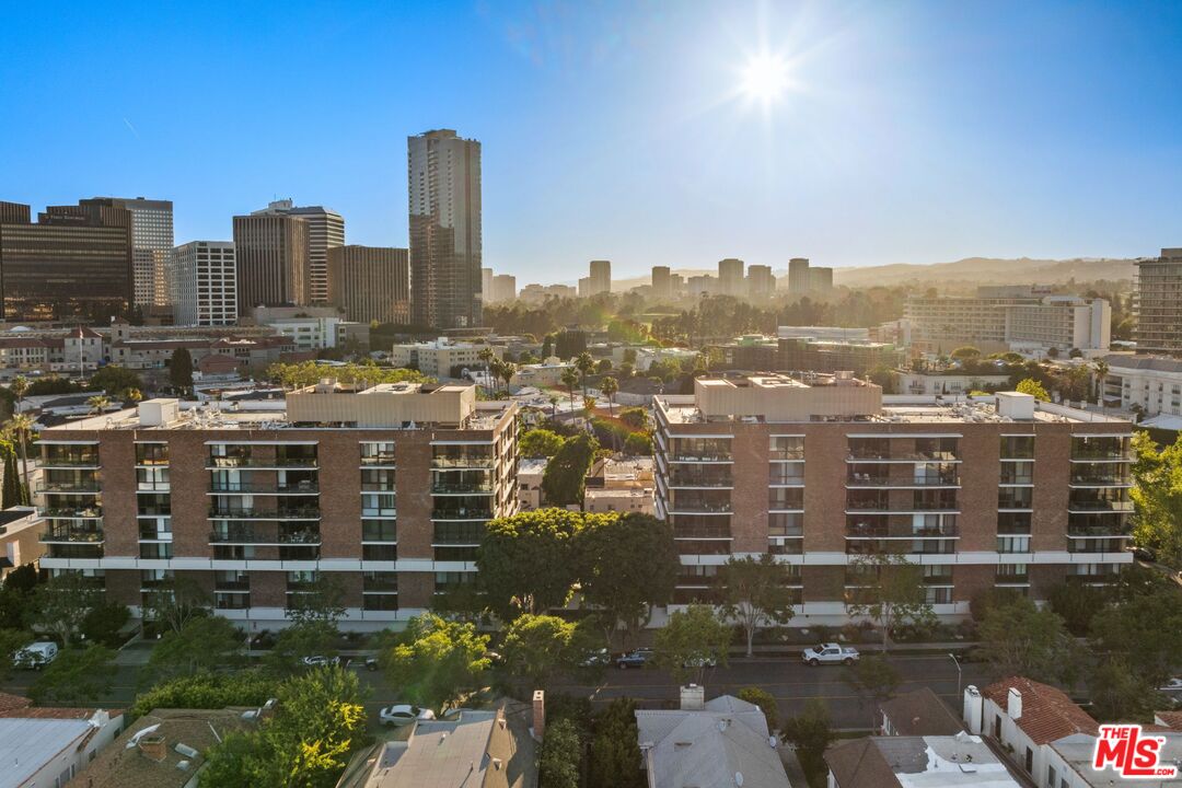 a view of a city with tall buildings