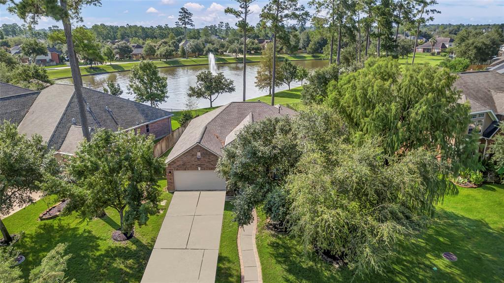 a view of a lake with a yard