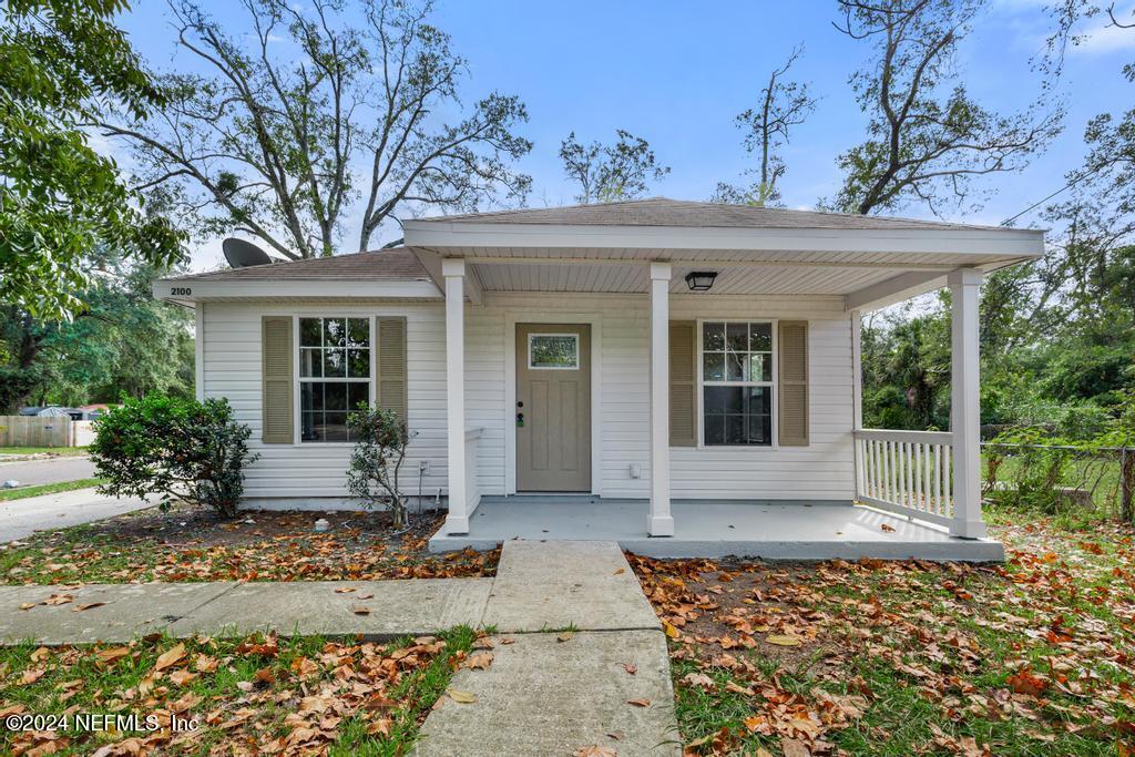 front view of a house with a small yard