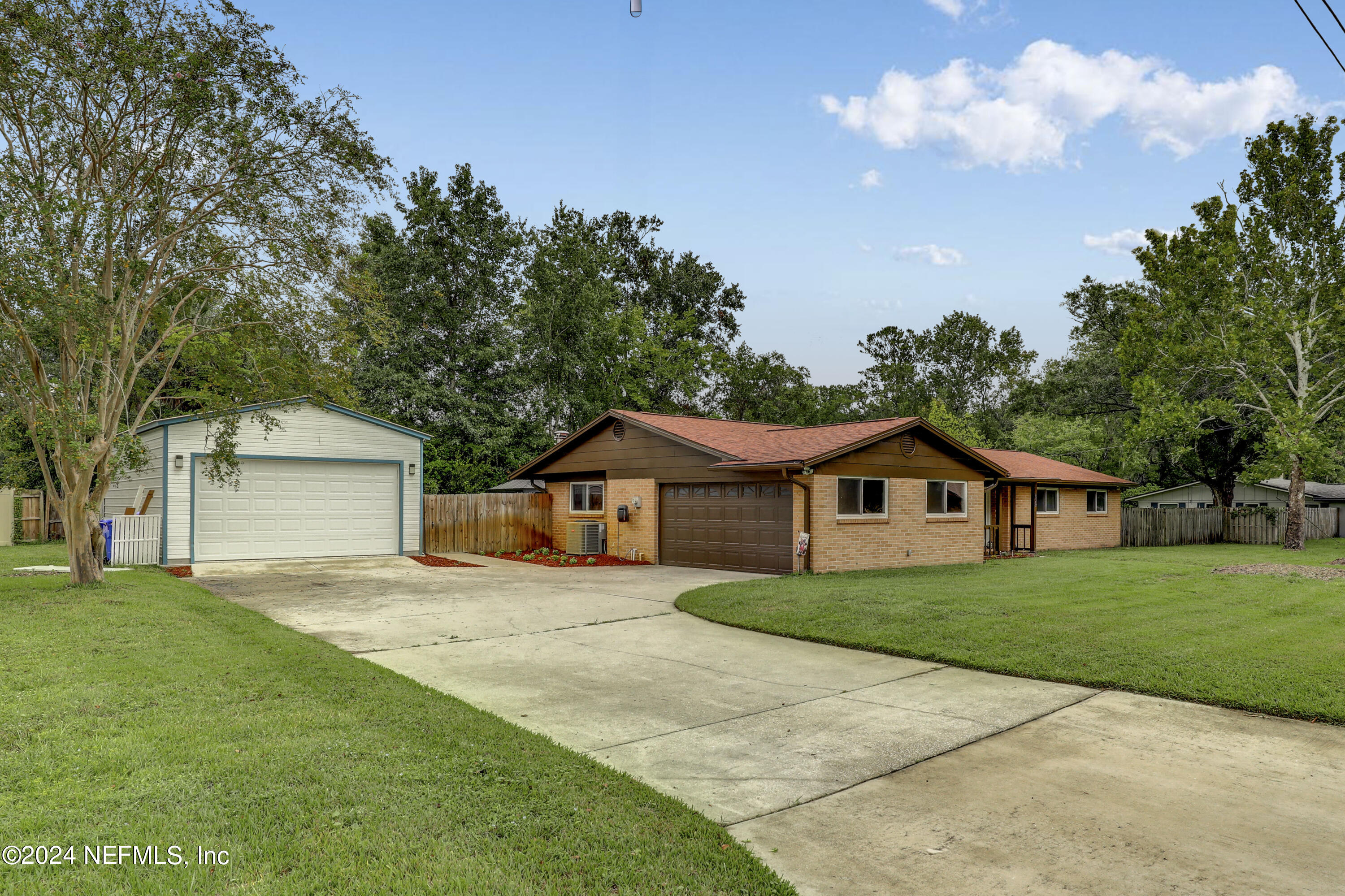 07 Front Exterior with Detached Garage