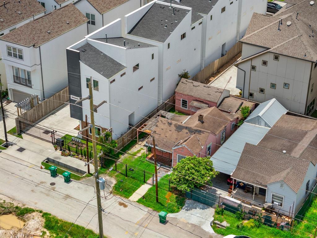 an aerial view of a house with a garden