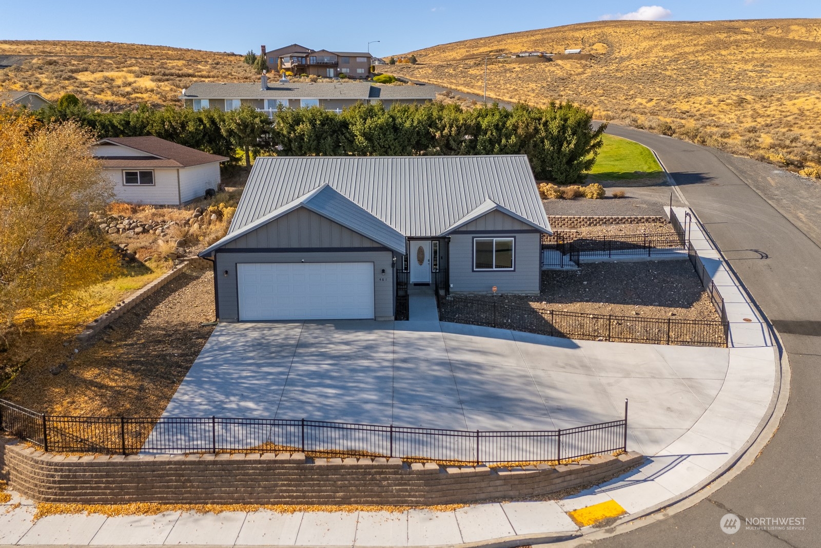 a view of a house with a ocean view