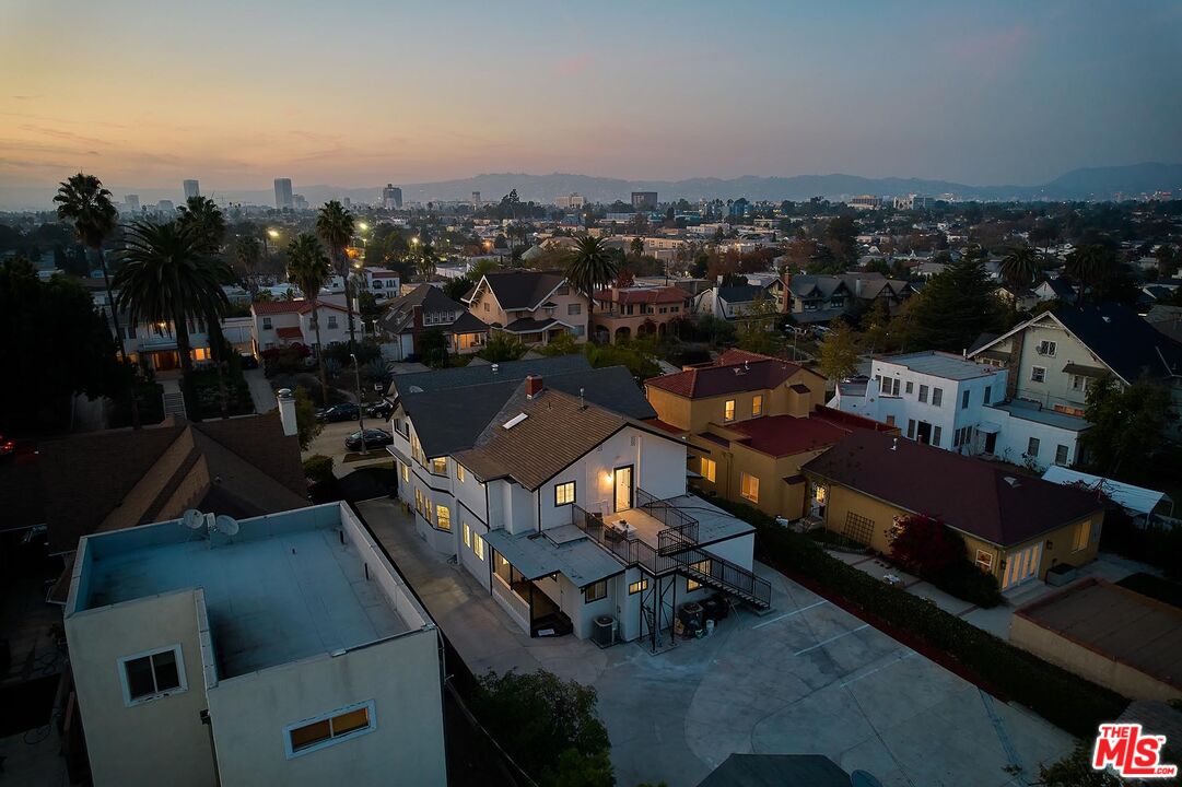 an aerial view of a house with outdoor space