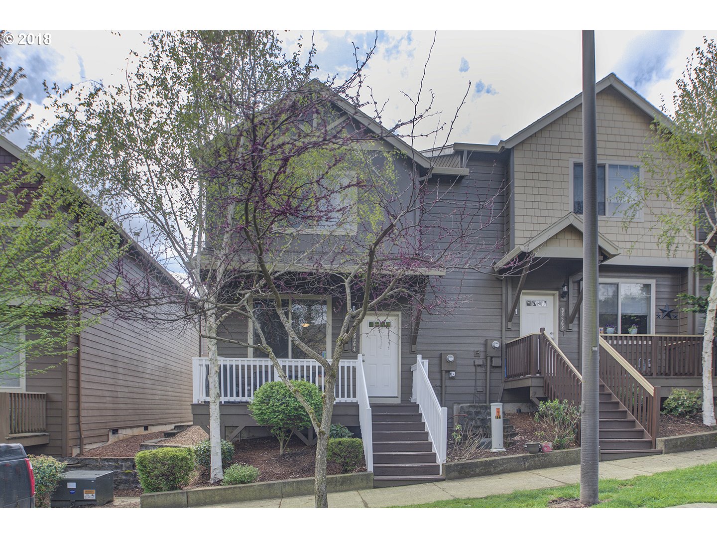 front view of a house with garden