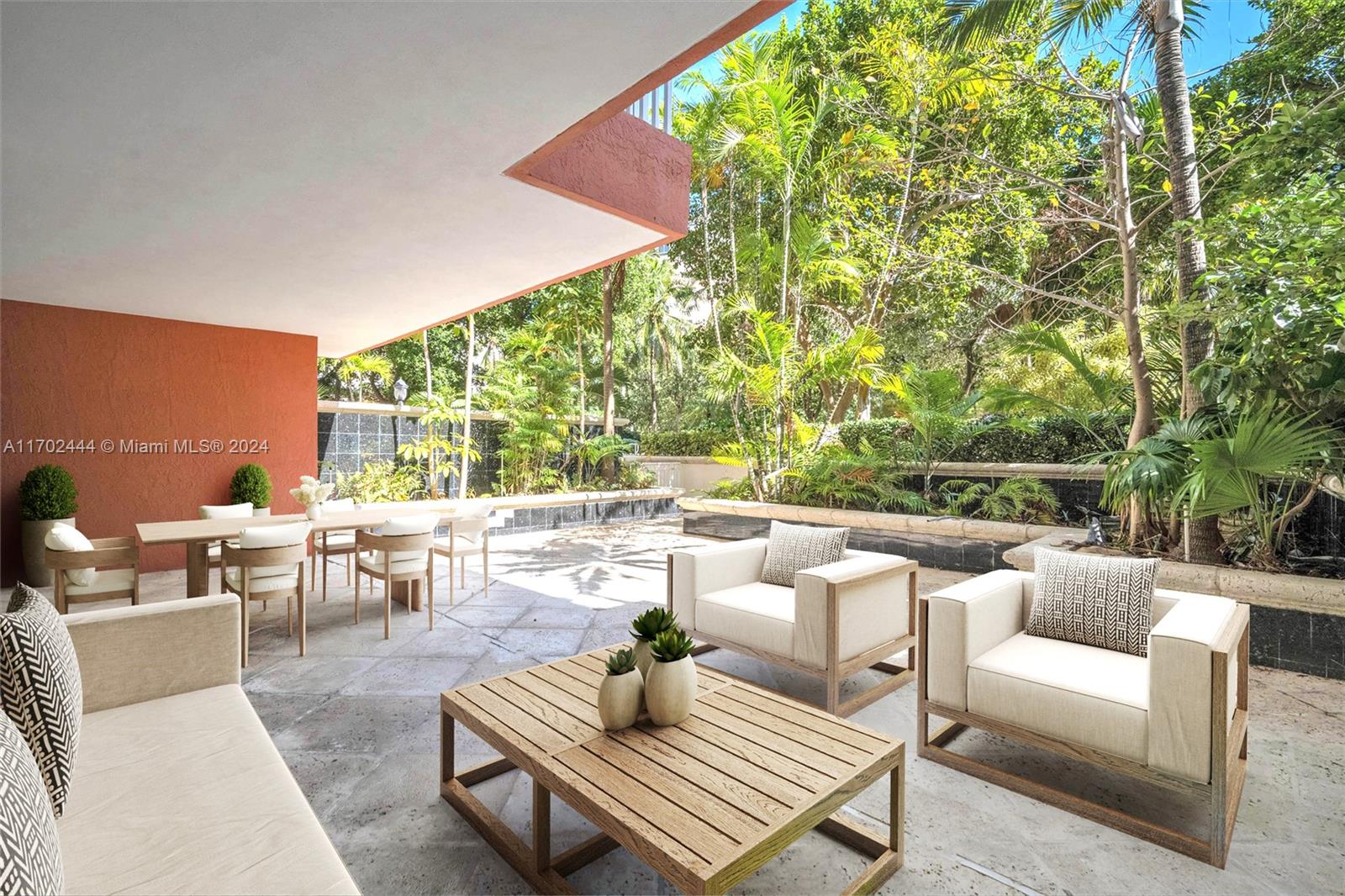 a outdoor living space with furniture and garden view