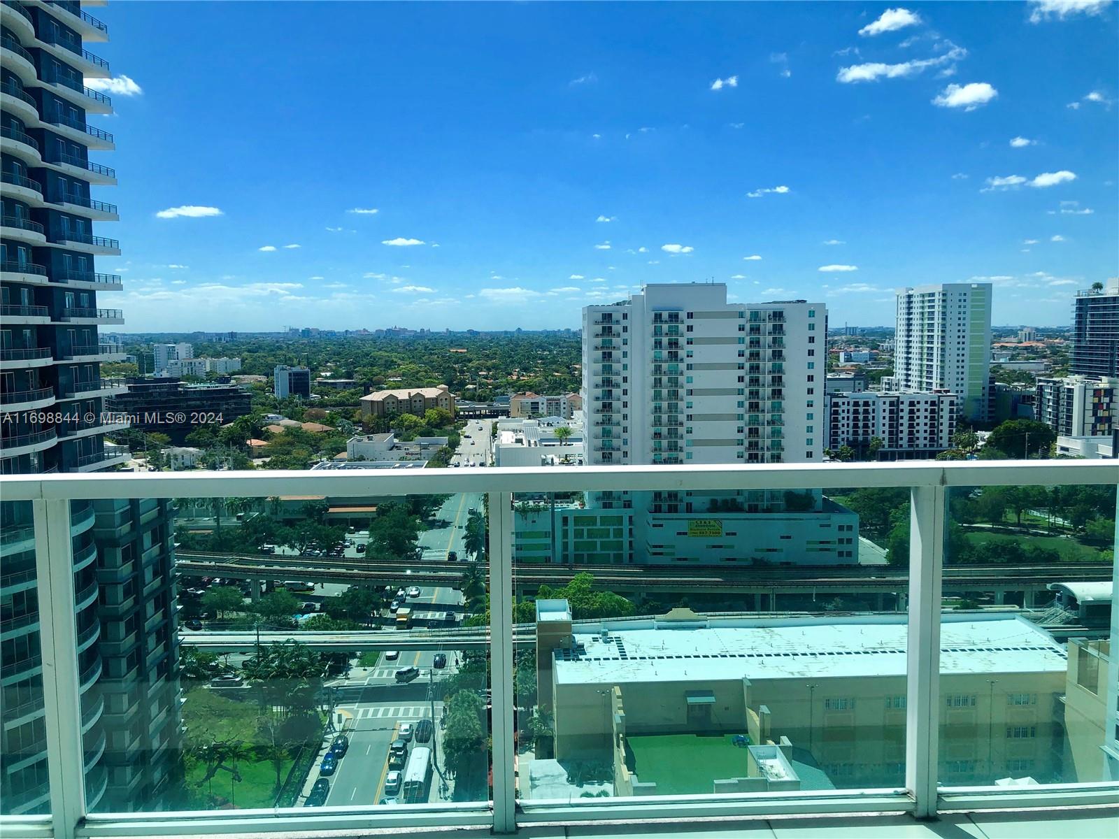 a view of a city from a balcony