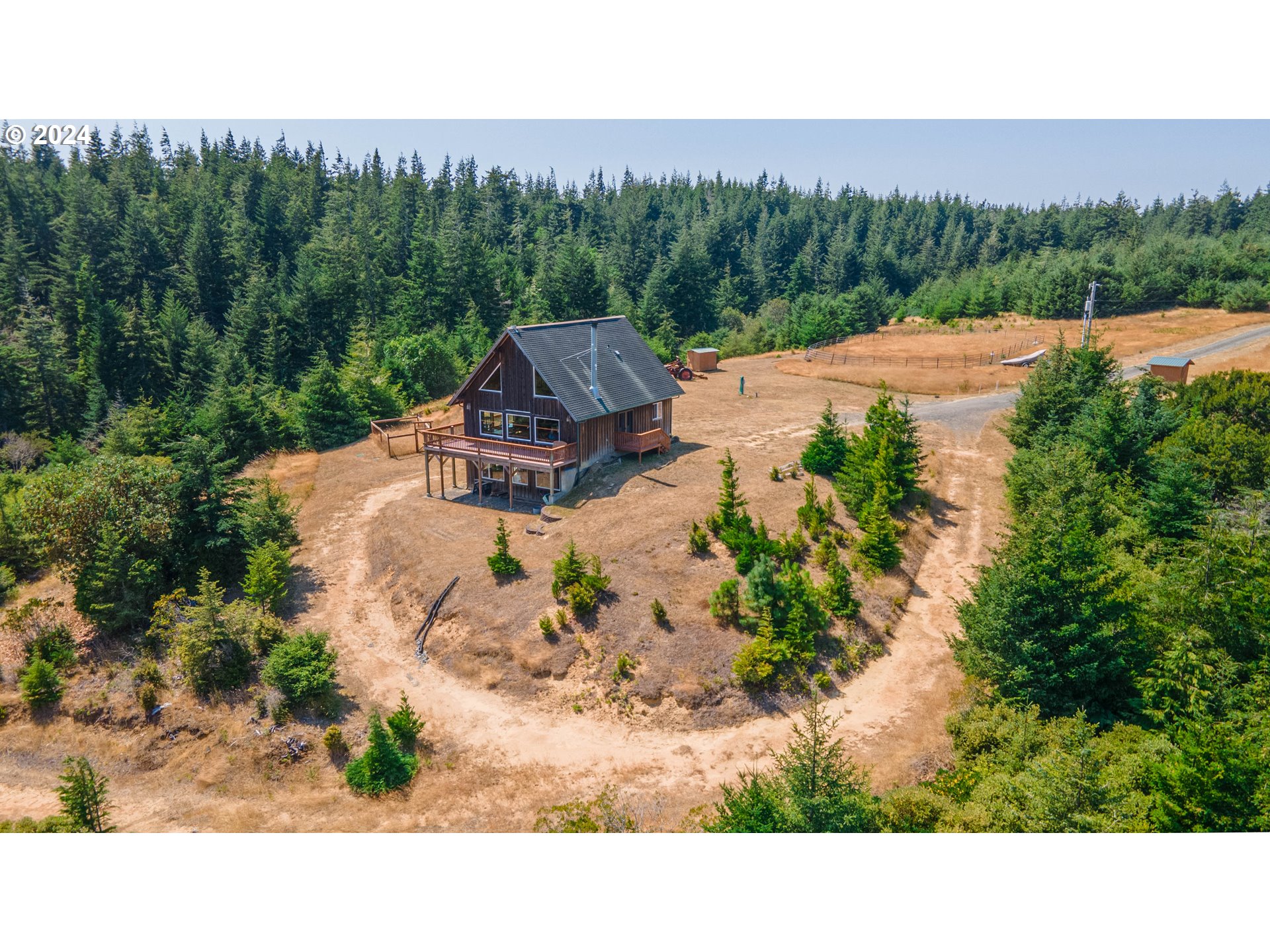 a bird view of a house with a yard