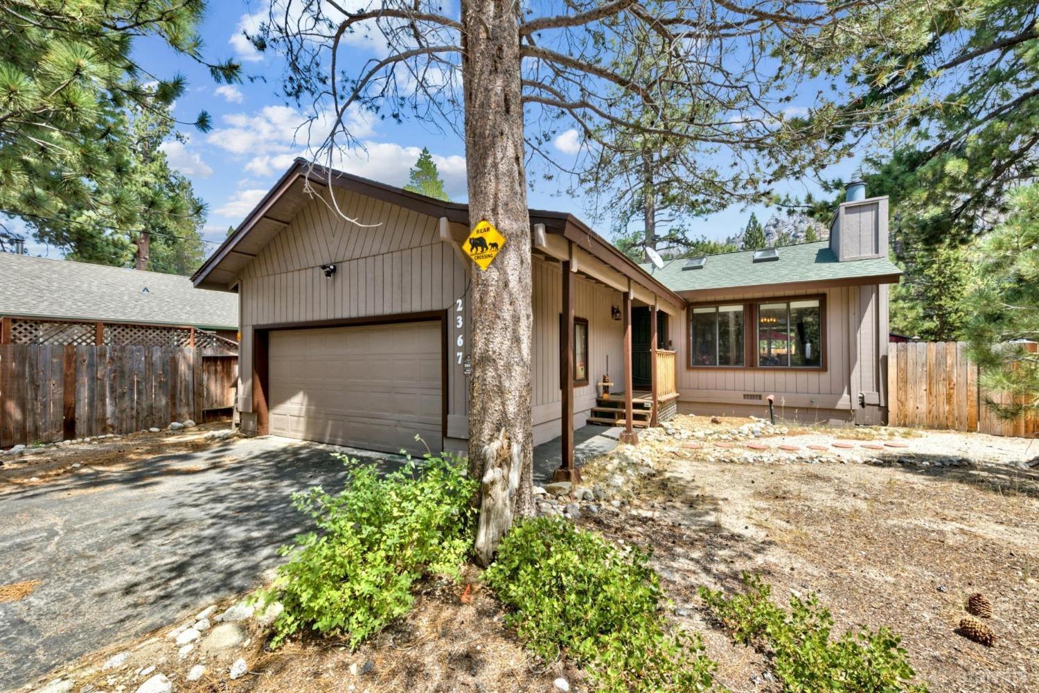 a house with trees in the background