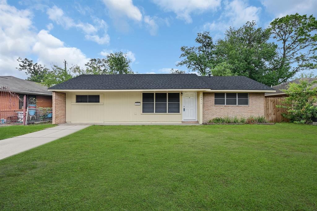 front view of a house and a yard