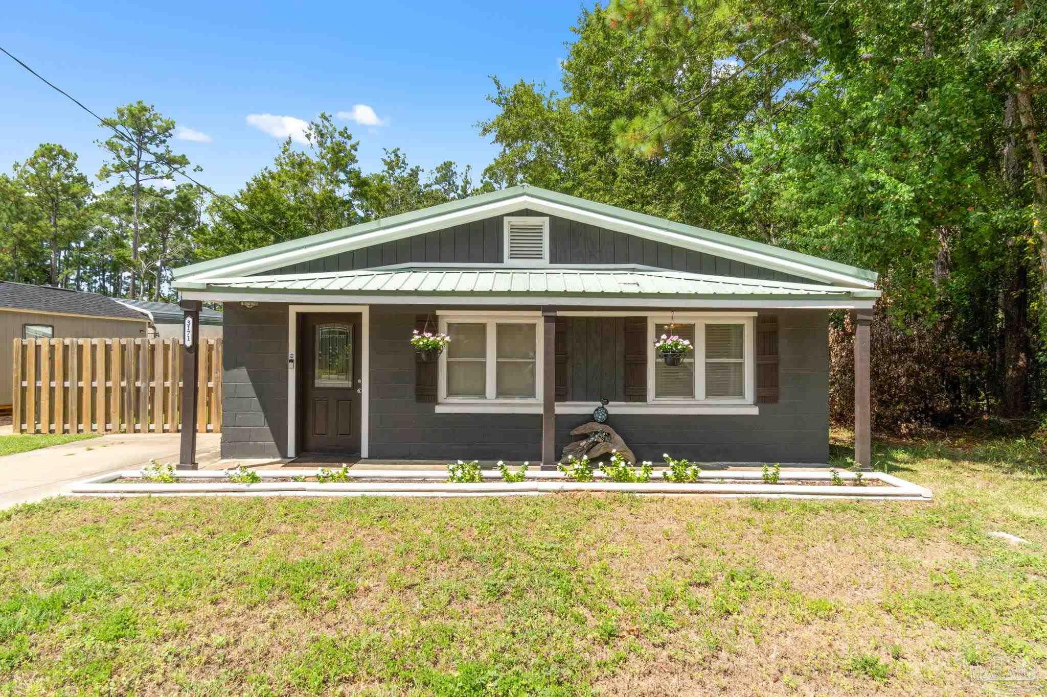 a front view of house with yard