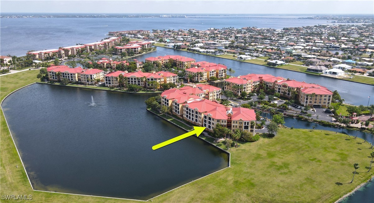 an aerial view of a houses with an outdoor space