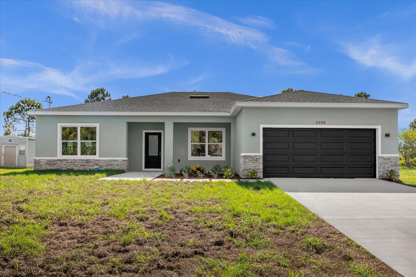 front view of a house with a yard