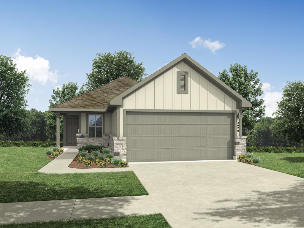 a front view of house with yard and green space