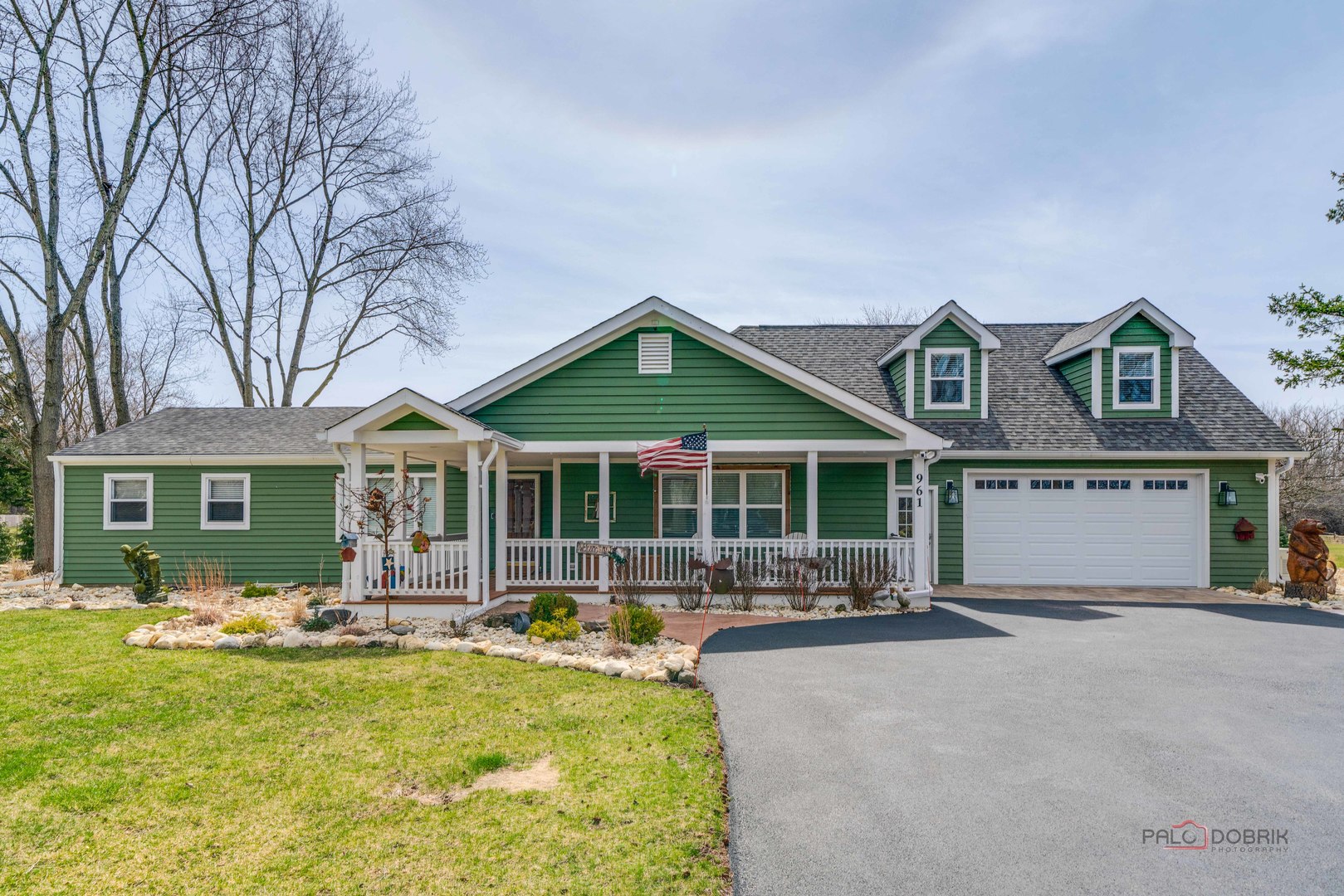 front view of a house with a yard