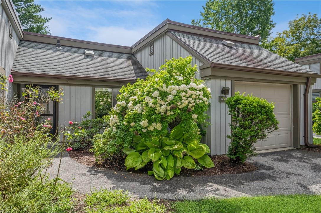 View of front of home with a garage