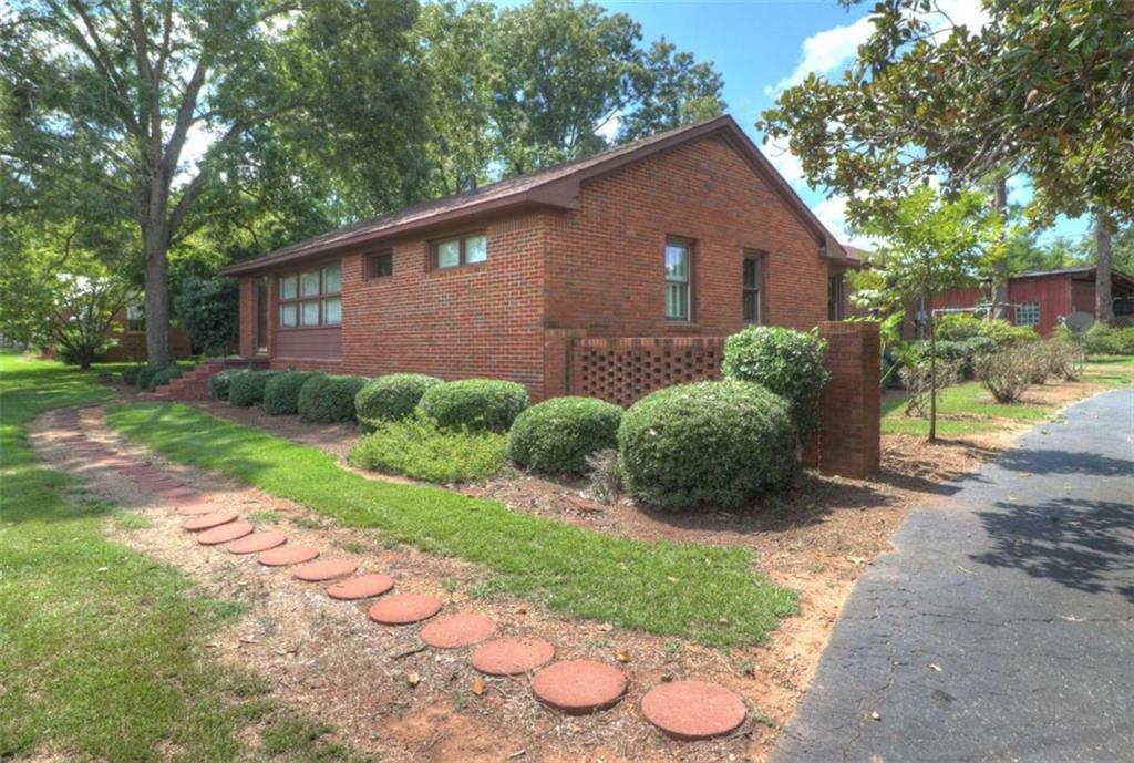 a view of a back yard of the house