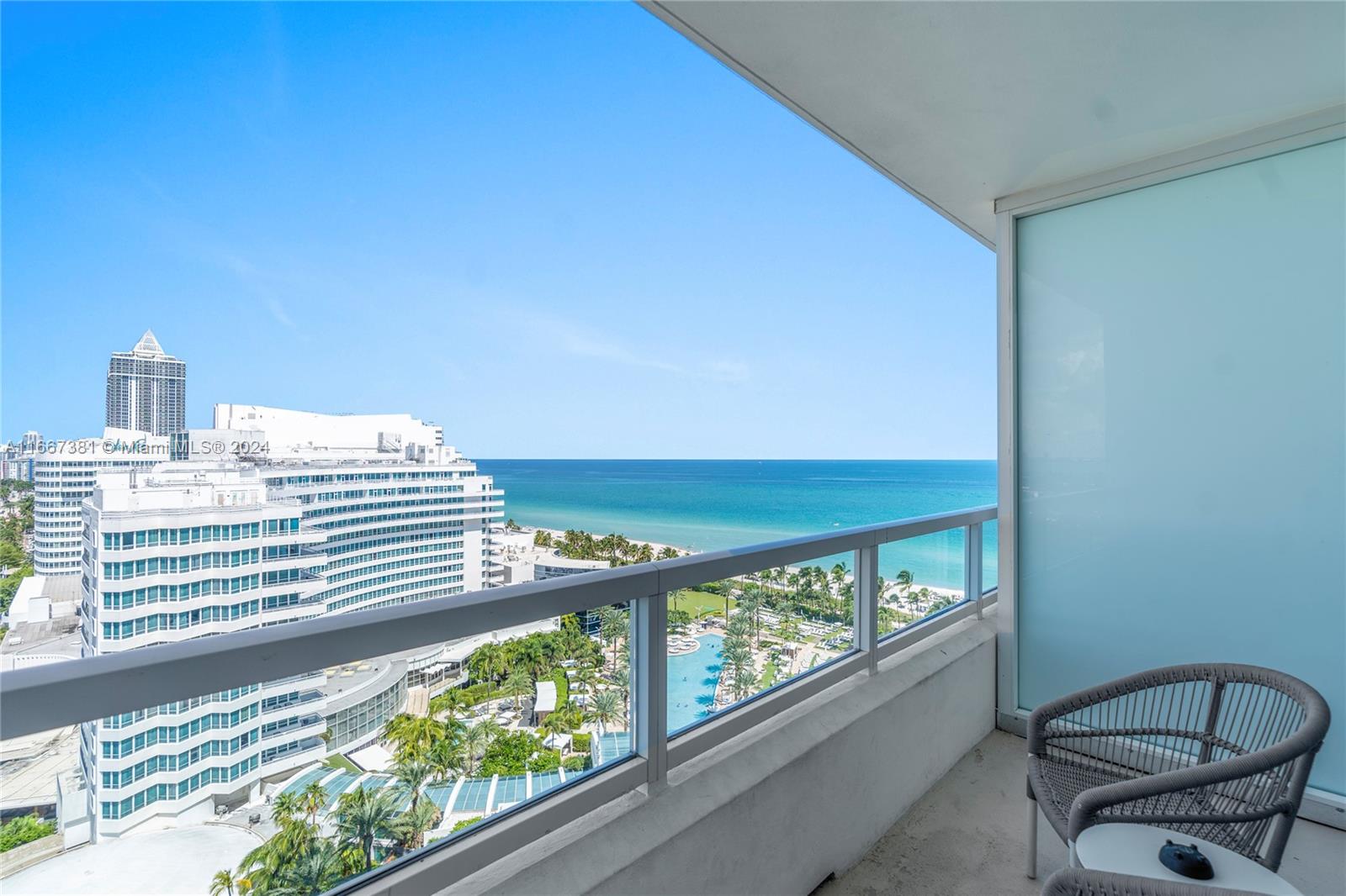 a view of a balcony with chairs