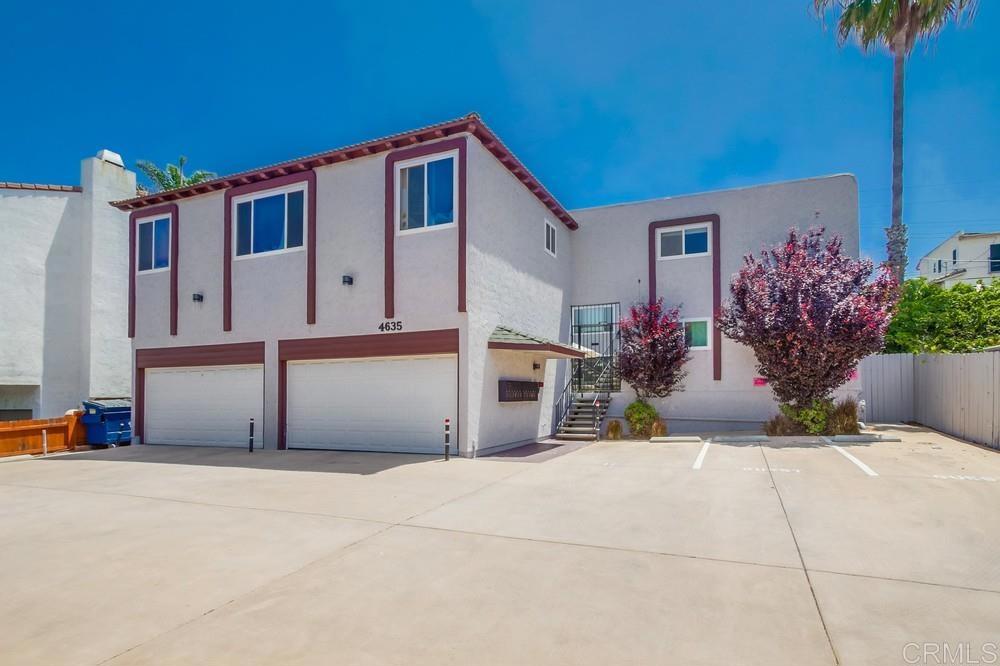 a front view of a house with a garage