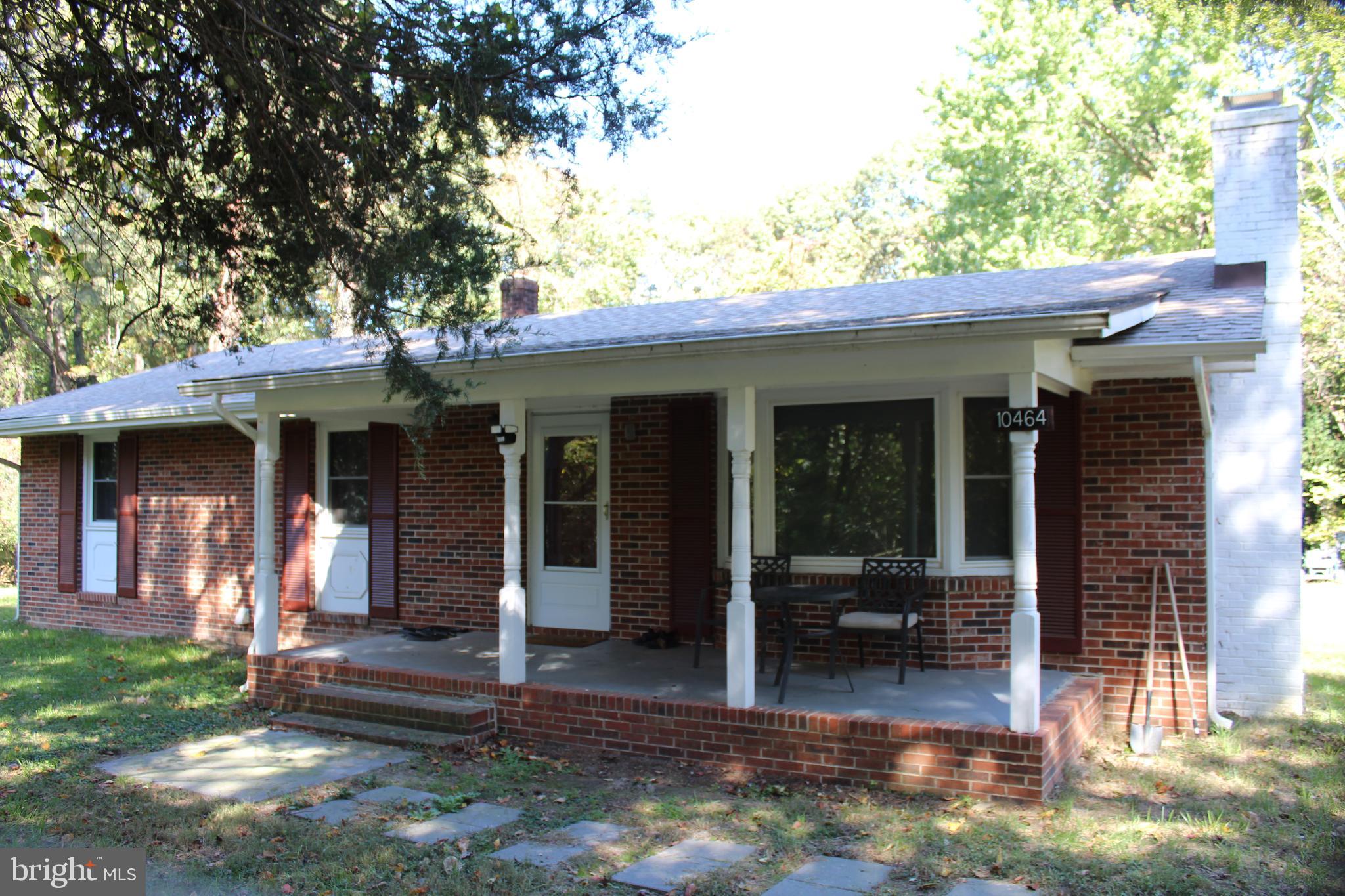 a front view of a house with a porch