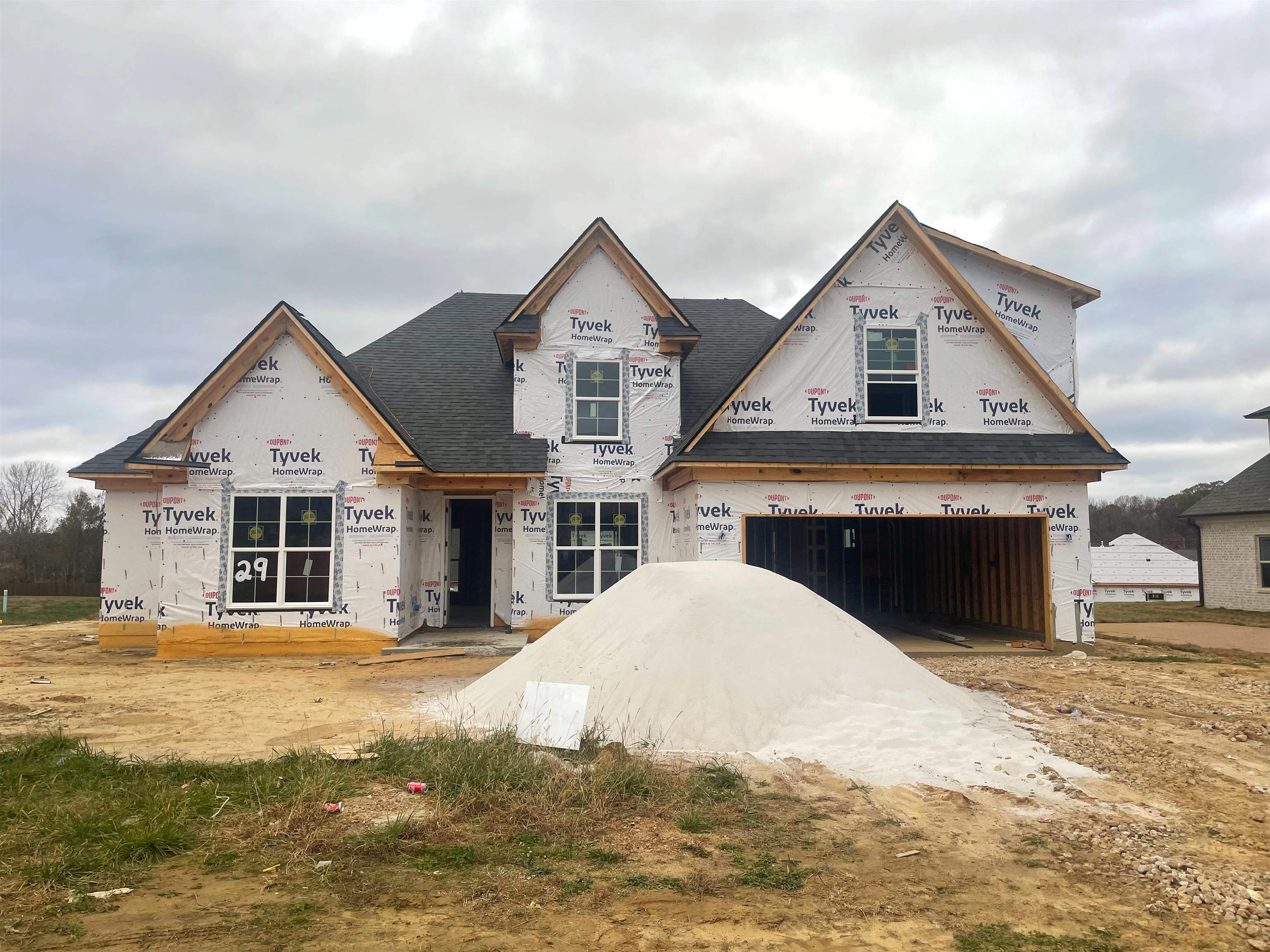 a view of a house with a yard