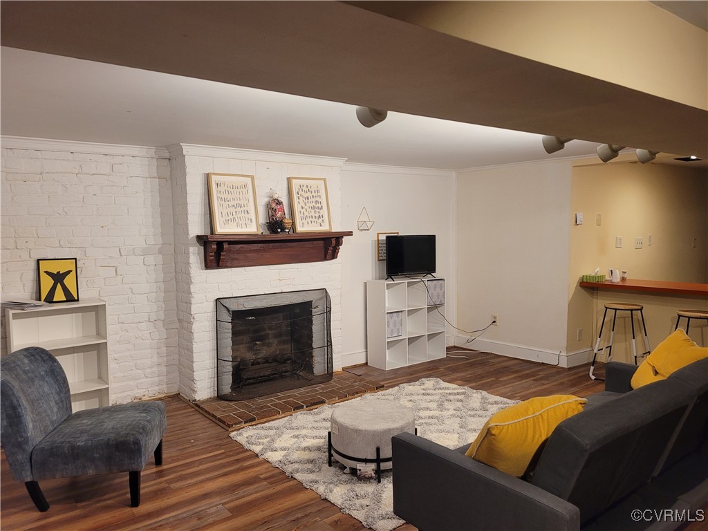 a bedroom with furniture and a fireplace