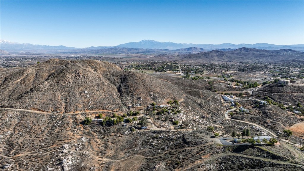 an aerial view of residential house and green space