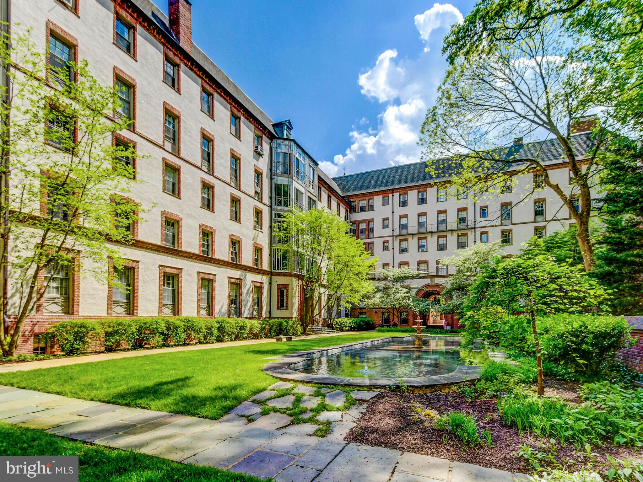 a view of a building with a garden