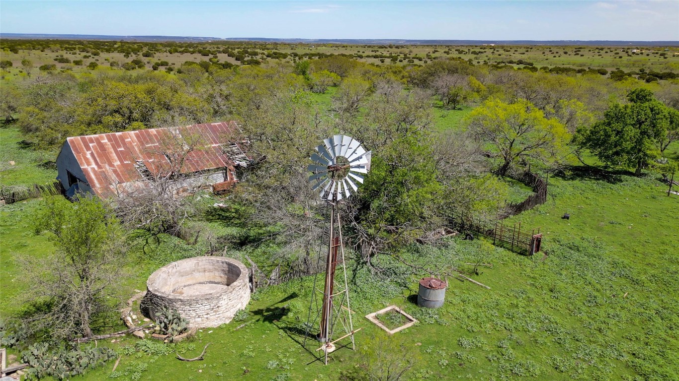 a view of a back yard from a lake view